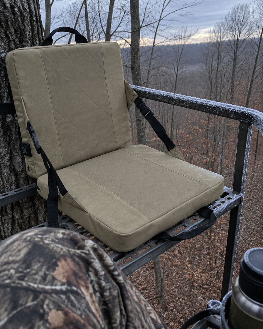 Khaki heated seat on a hunting tree stand